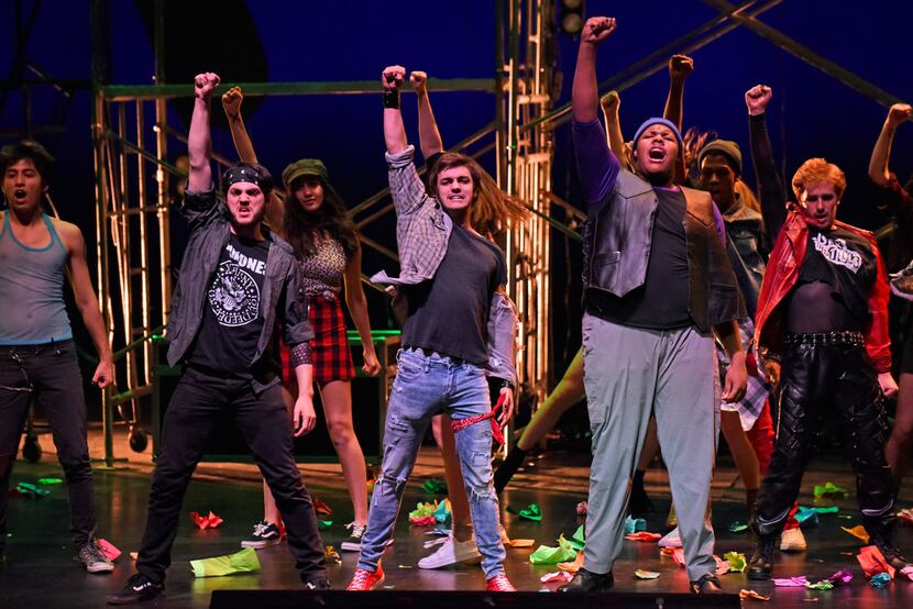 Johnny, played by Griffin Shoemaker, third from left, and Tunny, played by Darnell Robinson,...