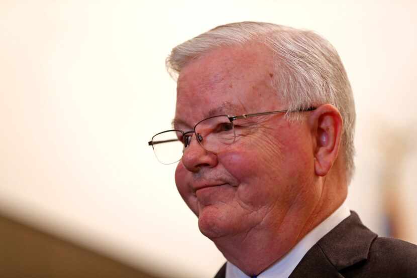 Rep. Joe Barton pauses while speaking during a town hall meeting at Corsicana Government...