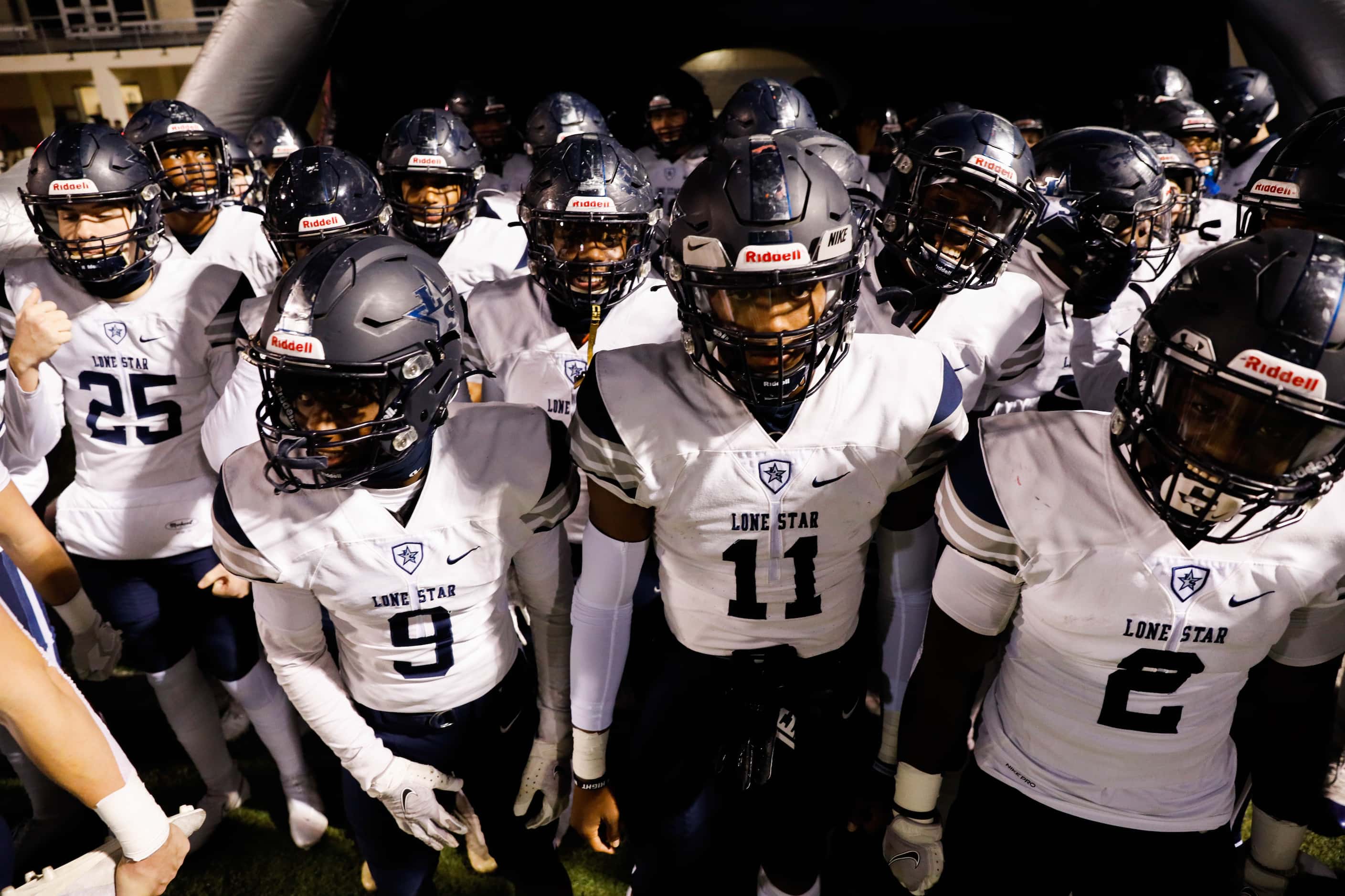 Frisco Lone Star players get ready before the start of a football game against Denton Ryan...