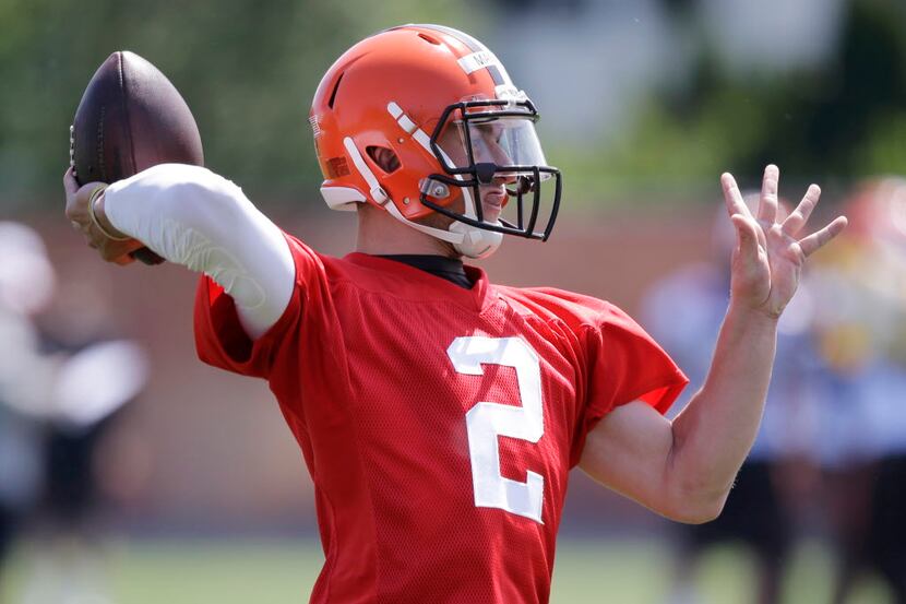 Cleveland Browns quarterback Johnny Manziel throws during an NFL football organized team...