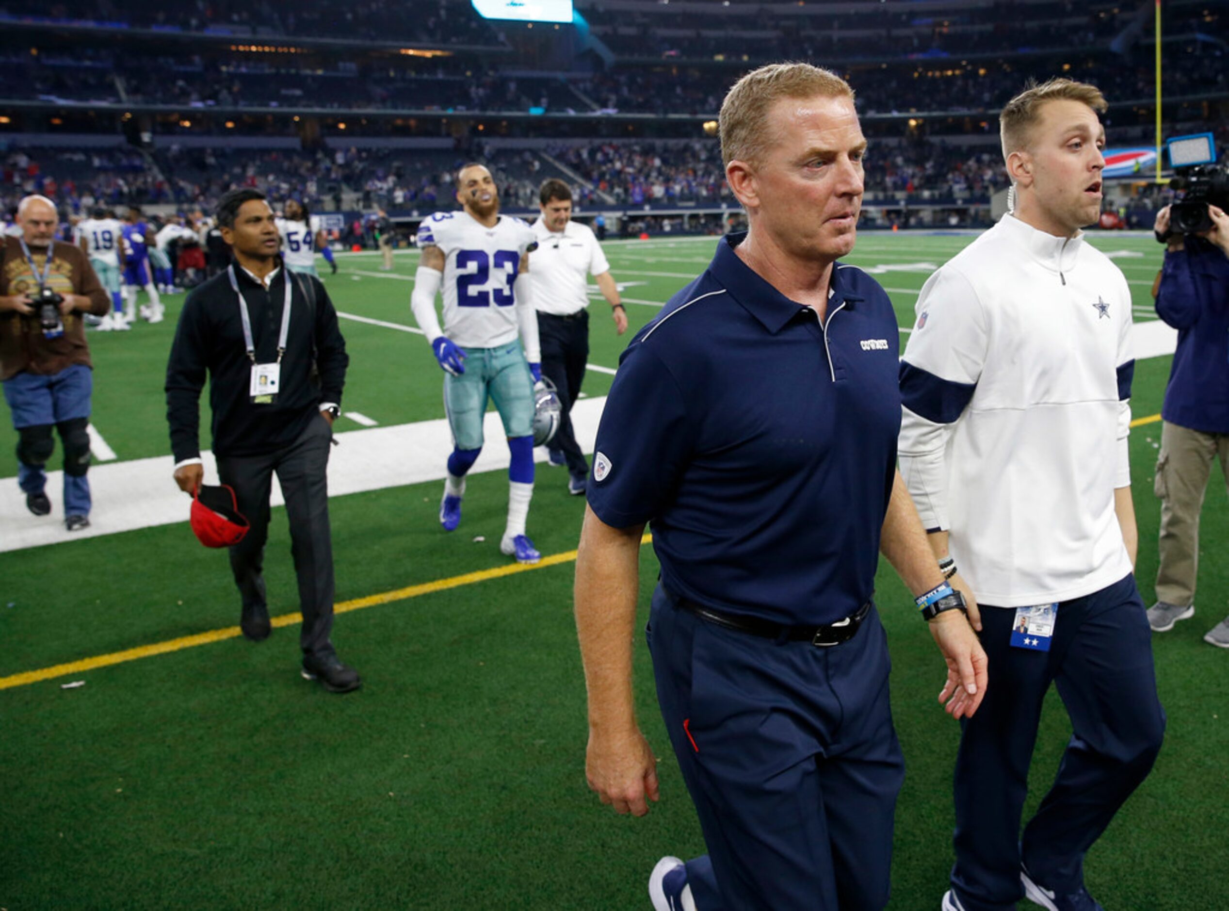 Dallas Cowboys head coach Jason Garrett exits the field after losing to the Buffalo Bills...