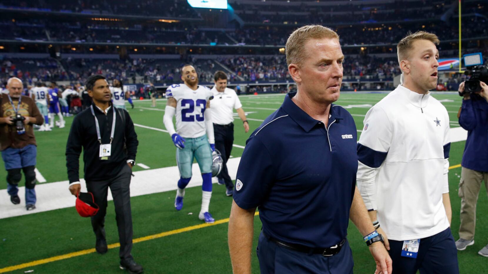 Dallas Cowboys head coach Jason Garrett exits the field after losing to the Buffalo Bills...