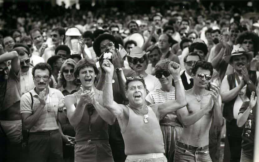 Gay supporters applaud a speaker in Lee Park after the Pride Parade in June  1983.