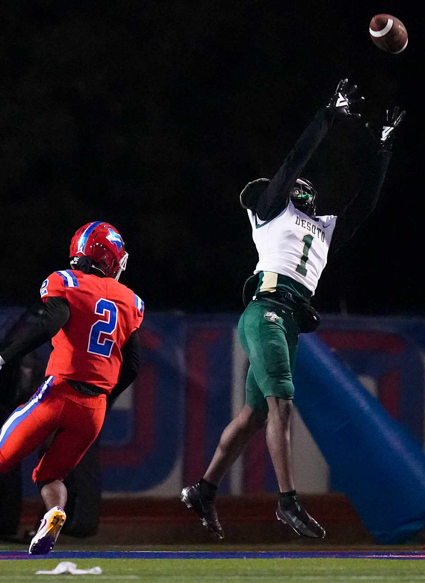 A pass sails out of the reach of DeSoto wide receiver Johntay Cook II (1) as Duncanville...