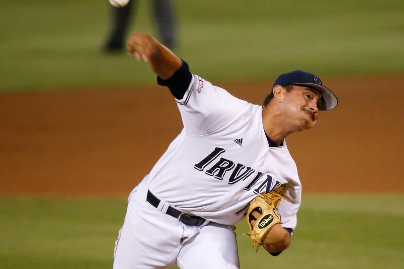 UC Irvine Andrew Morales pitches in the first inning of an NCAA college baseball tournament...