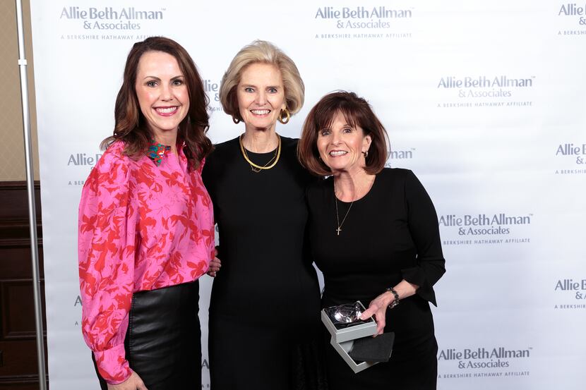 From left, agent Leslie Moore, president/CEO Allie Beth Allman and Nanette Ecklund-Luker,...