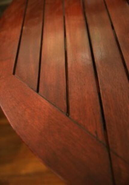  Building furniture, like this table in his home, keeps Glenn Billingsley's hands, and mind,...