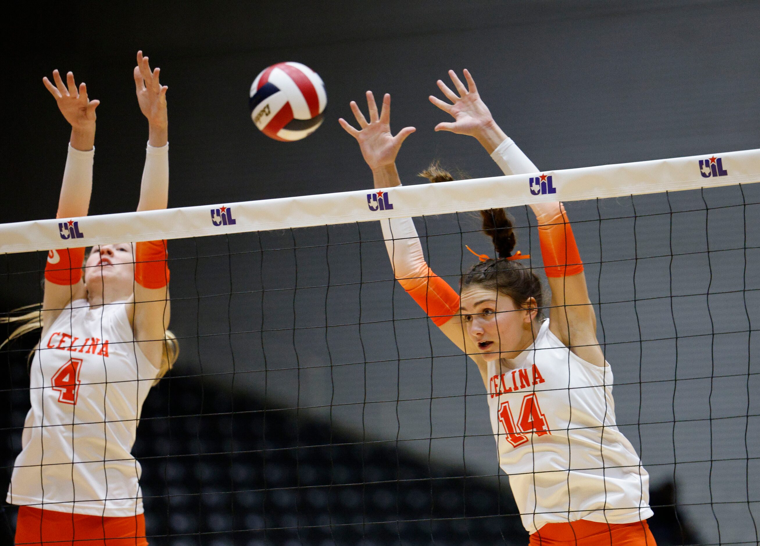 Celina's Selah Nickel (4) and Celina's Kennedy Hangartner (14) try to block against Comal...