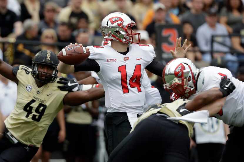 FILE - Western Kentucky quarterback Mike White (14) plays against Vanderbilt in the first...