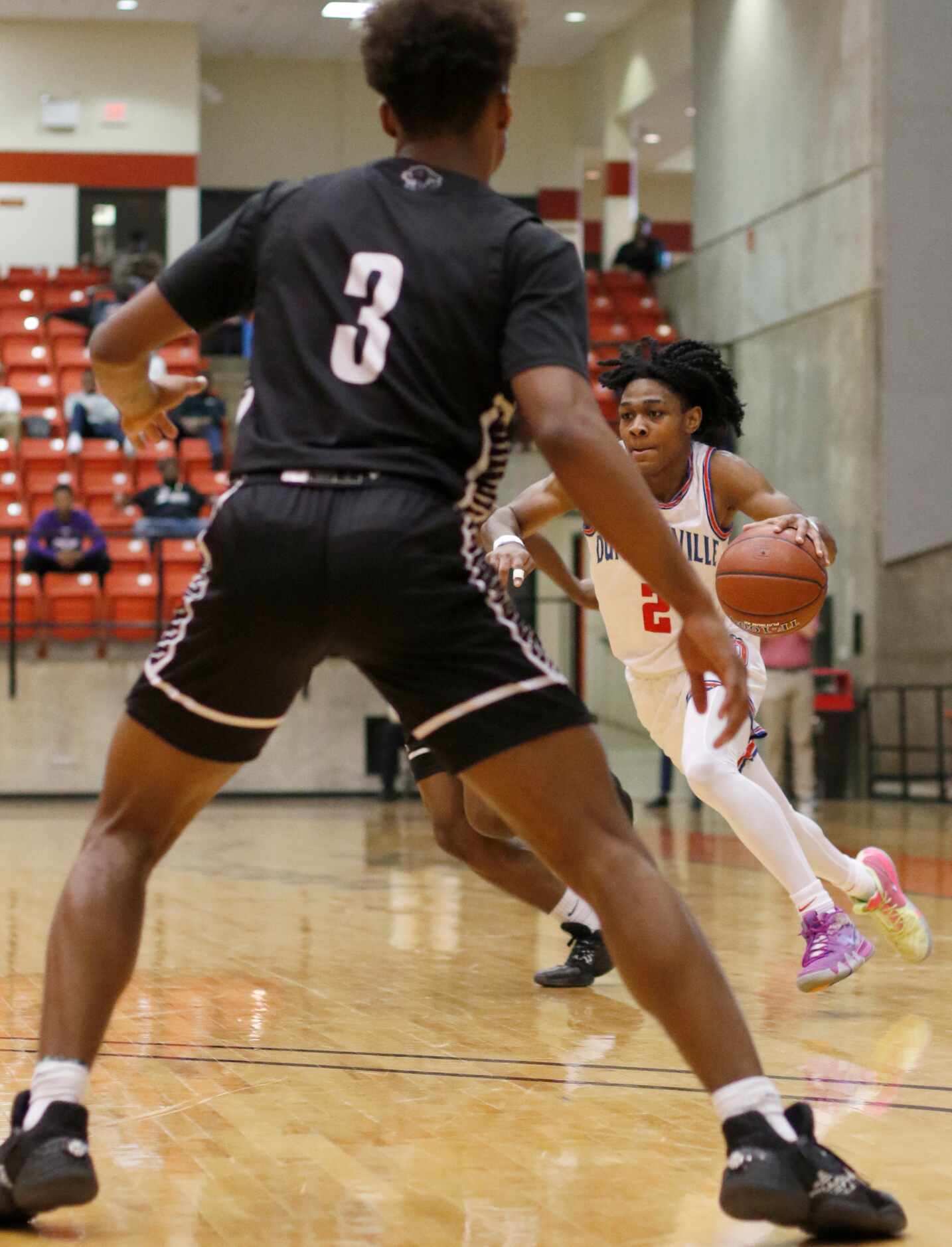 Duncanville guard Ja'Bryant Hill (2) drives the lane as Odessa Permian guard Shy Stephens...