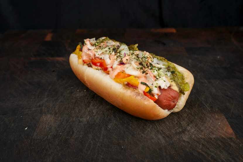 AT&T Stadium has added several new hot dogs to the menu in 2021. Here's the Sumo Dog: a hot...