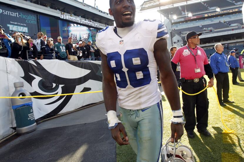 Dallas Cowboys wide receiver Dez Bryant (88) walks off the field after they defeated the...