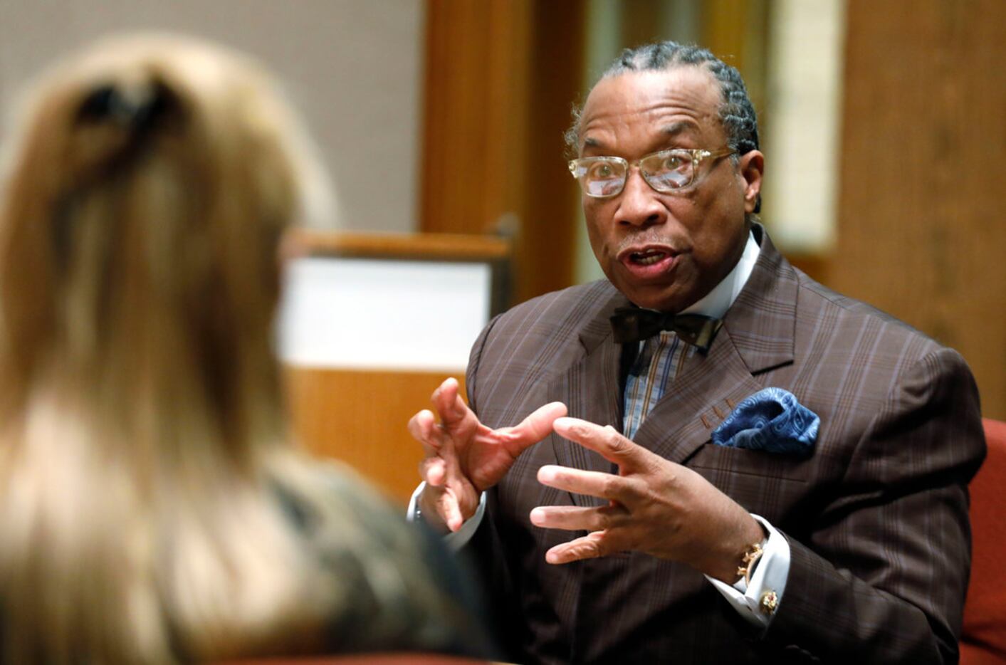 Dallas County Commissioner John Wiley Price, right, took part in a meeting with interim...