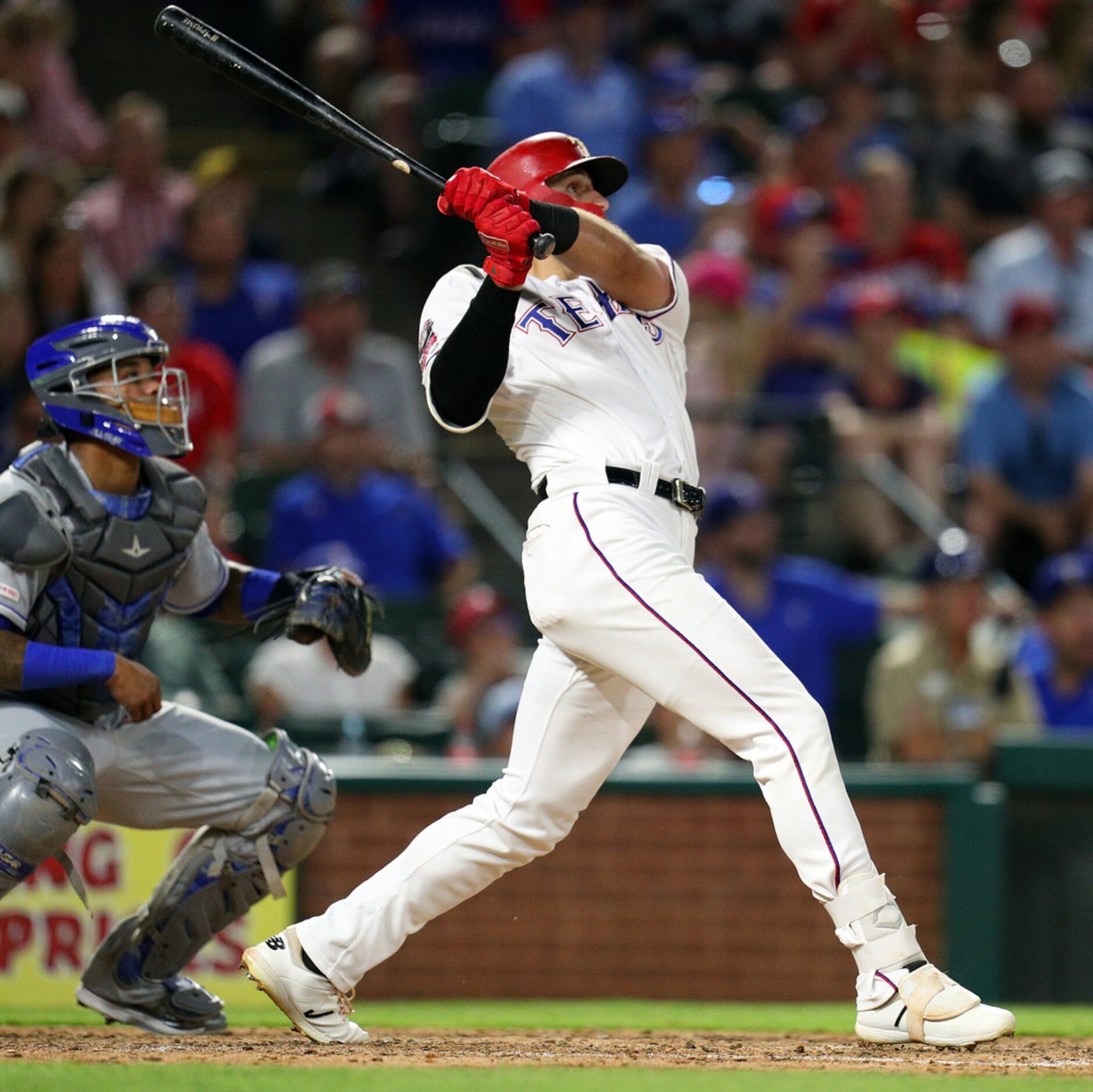 ARLINGTON, TEXAS - MAY 31: Joey Gallo #13 of the Texas Rangers watches his grand slam home...