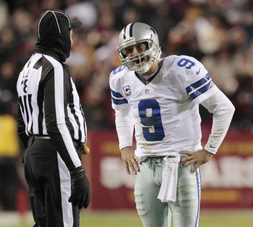 Dallas Cowboys quarterback Tony Romo (9) argues with a line judge during the second half of...