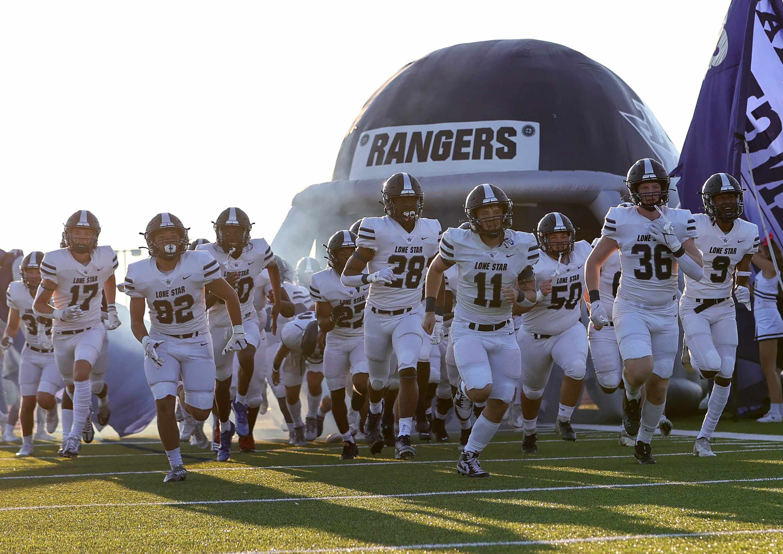 The Frisco Lone Star Rangers enter the field to face Frisco Reedy in a high school football...