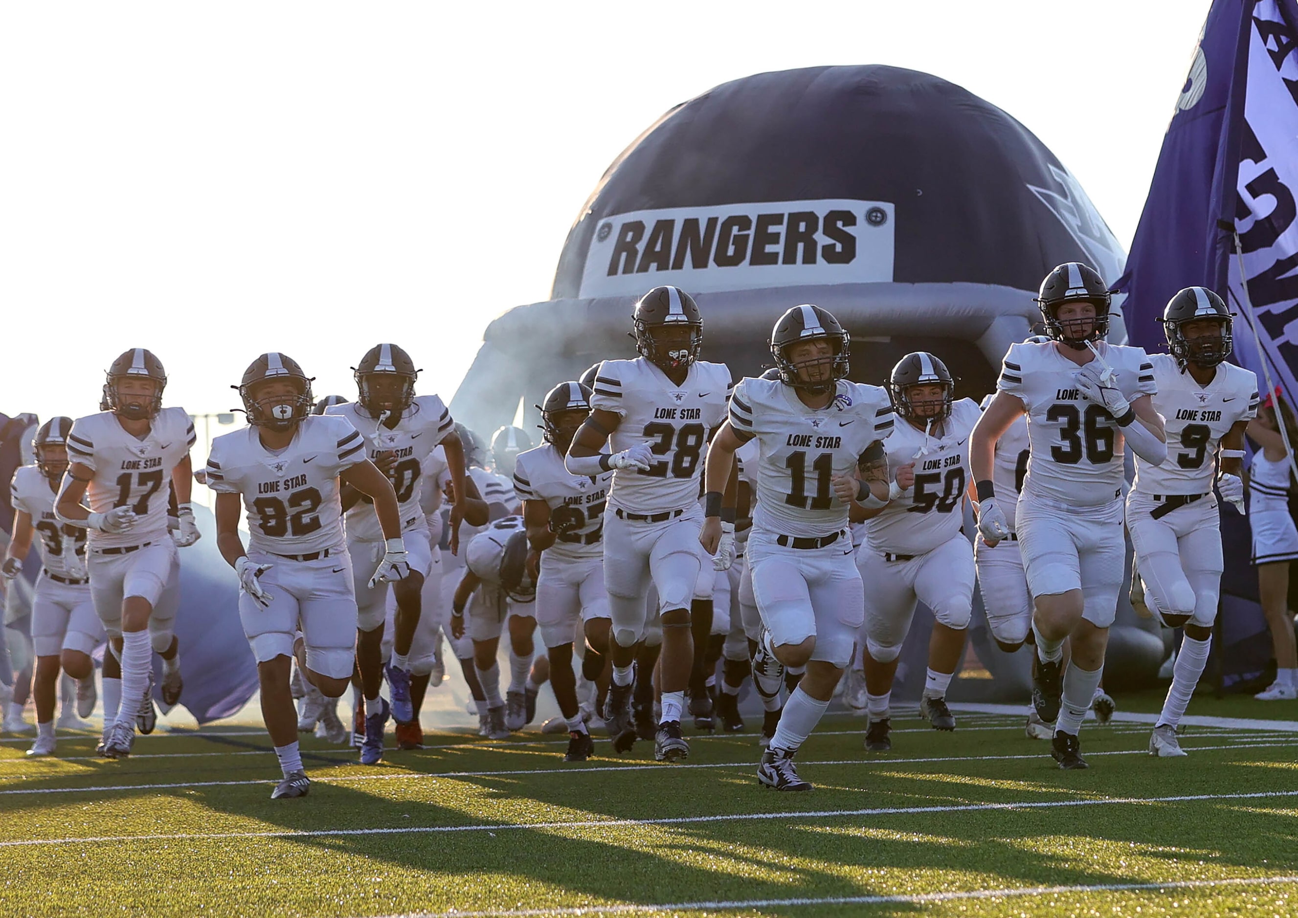 The Frisco Lone Star Rangers enter the field to face Frisco Reedy in a high school football...