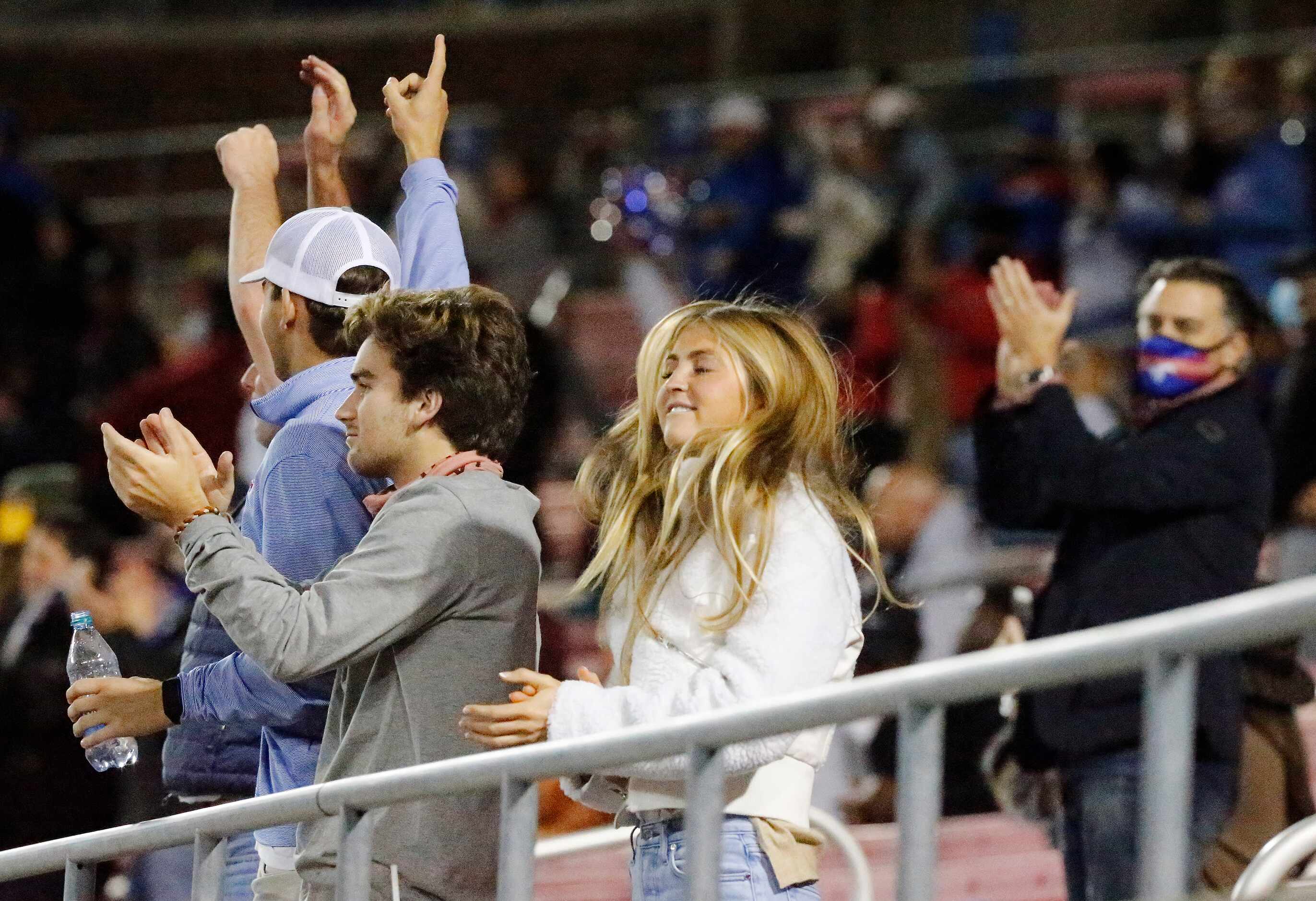 Southern Methodist Mustangs fans react to a touchdown during the first half as SMU hosted...