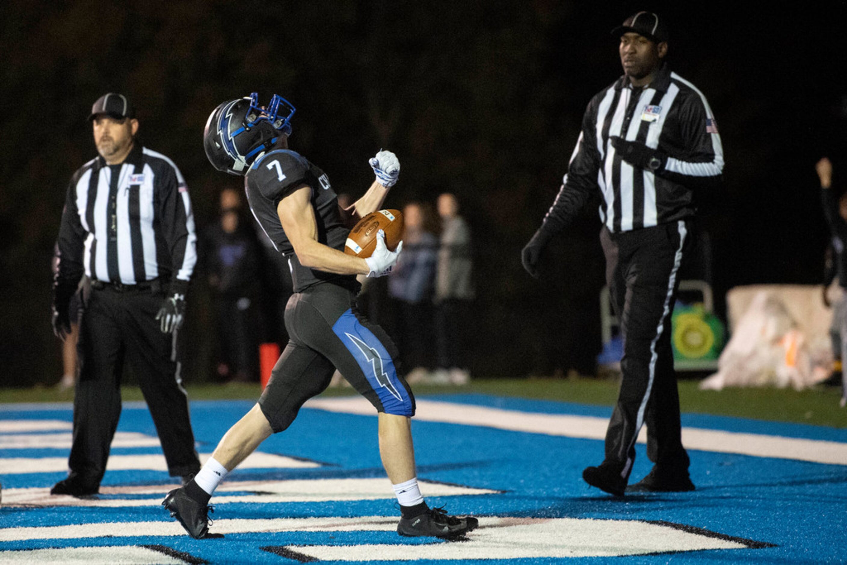 Dallas Christian junior running back TJ King (7) celebrates a rushing touchdown against Fort...