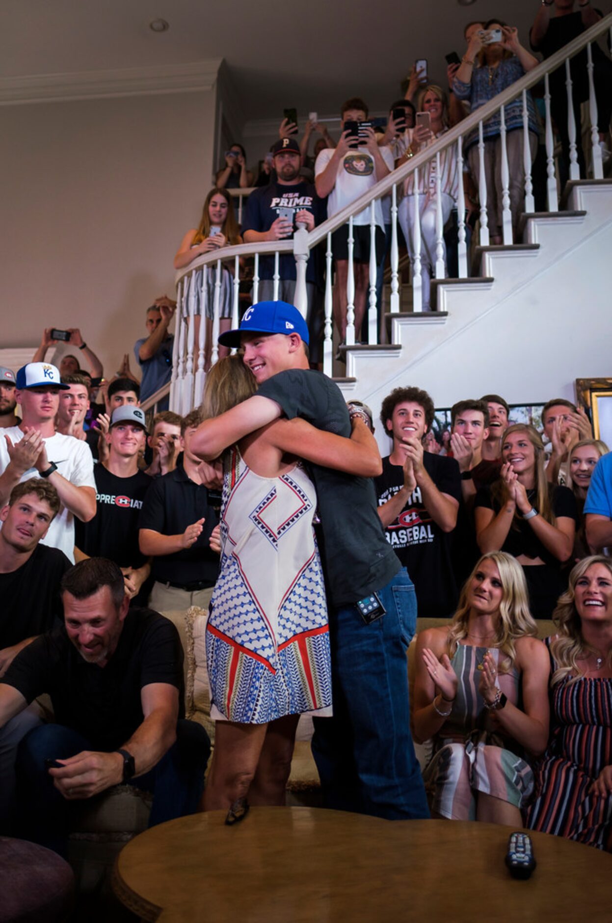 Bobby Witt Jr. hugs his mother Laurie Witt during a watch party at his home after being...