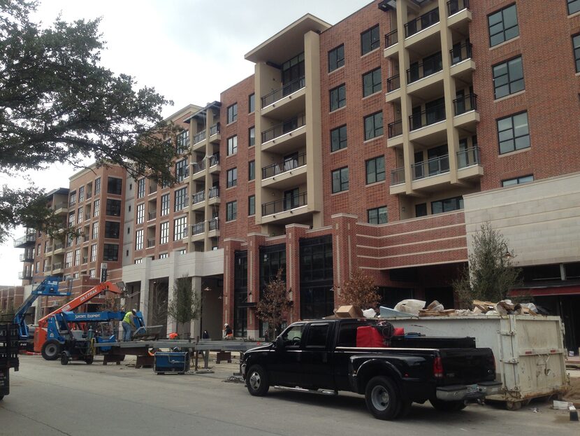 The recently completed 6-story building at Cole and Armstrong which houses Trader Joe's,...