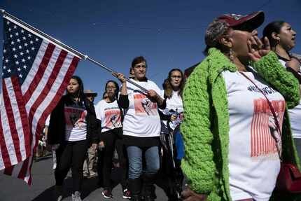 Protestors chanted, "No al muro!" (No to the wall!), during a march denouncing the border...