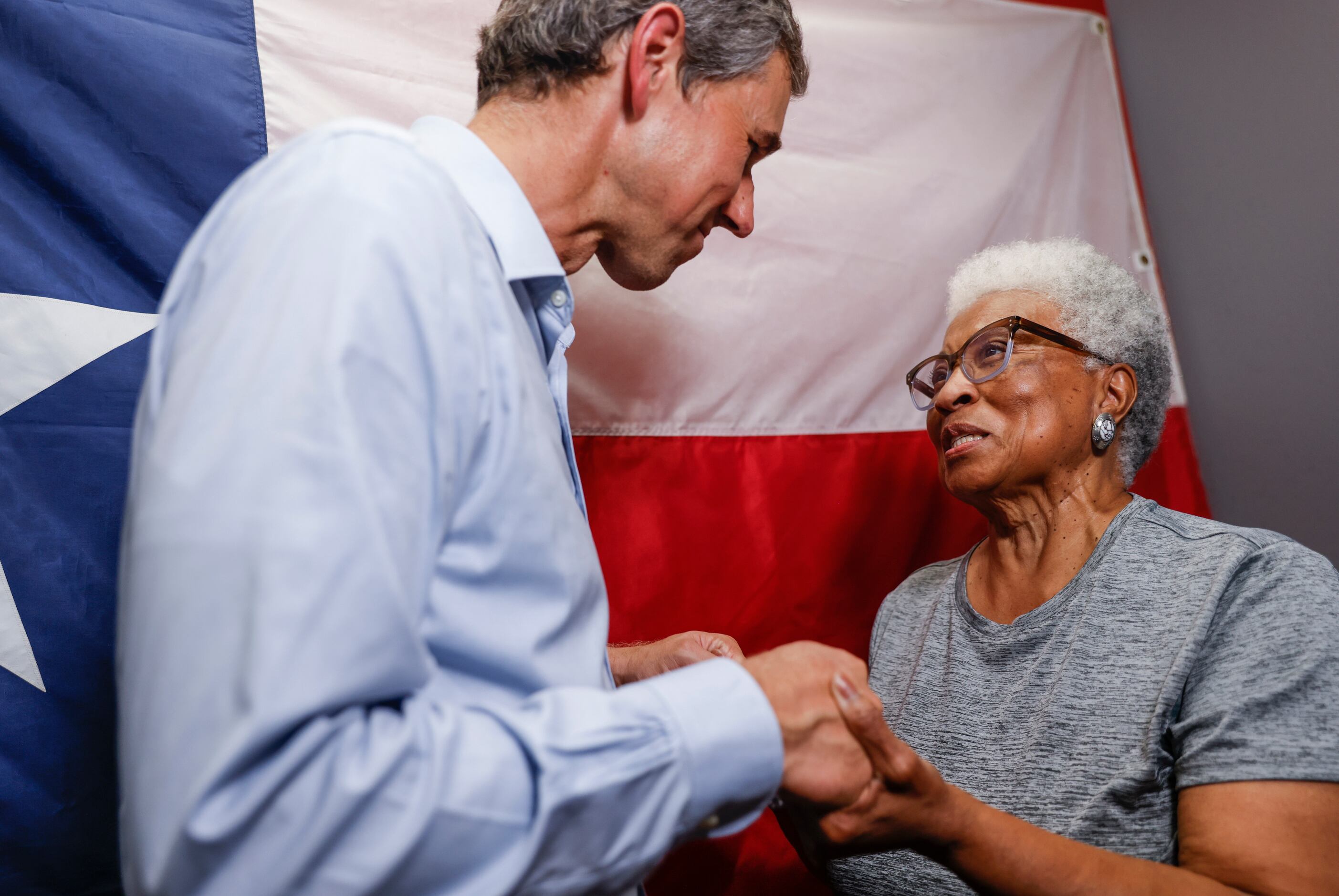 Texas Governor candidate Beto O'Rourke, greets Julia Williams, right, mother of one of the...