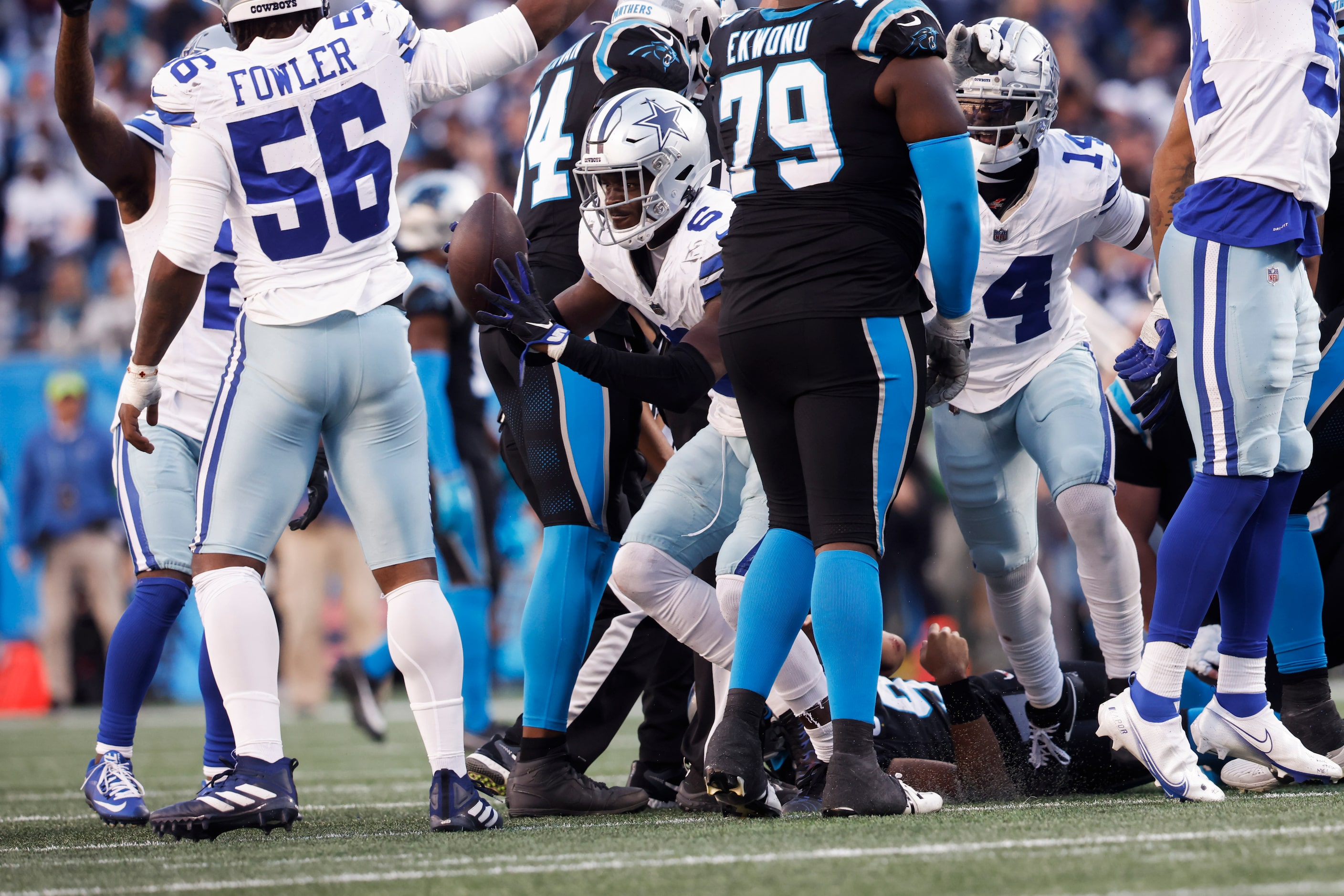 Dallas Cowboys safety Donovan Wilson (6) recovers a fumble during the fourth quarter of a...