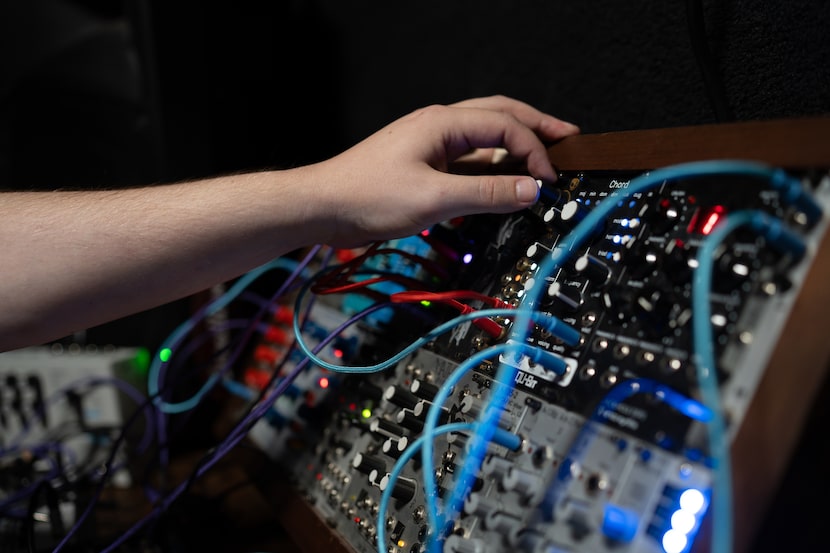 Keaton Collins, founder of open mic synthesizer nights "Mots", demonstrates how modular...