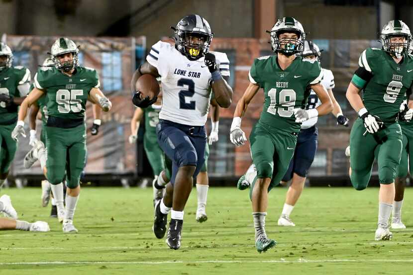 Frisco Lone Star’s Ashton Jeanty (2) runs for a long touchdown in the first half of a high...