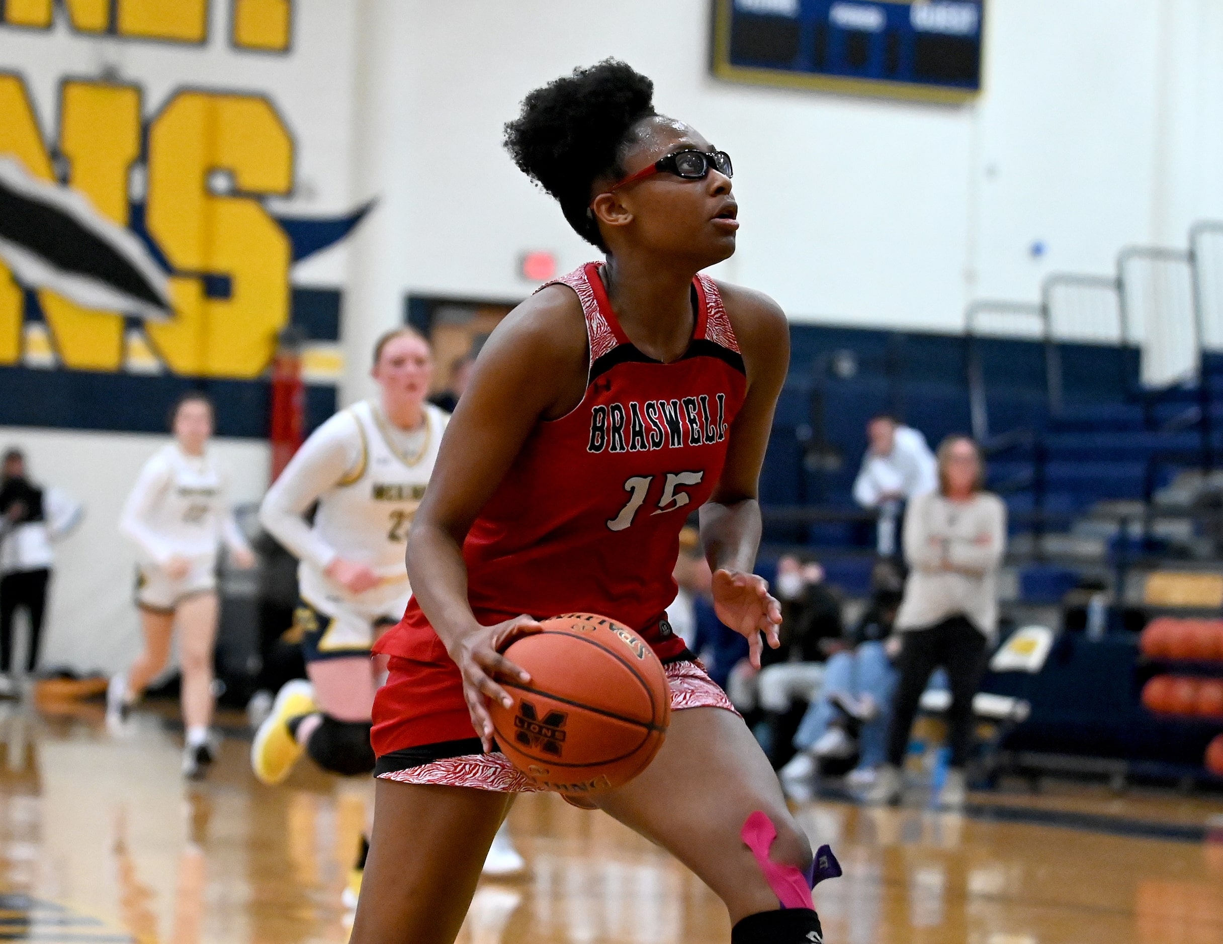 Braswell’s Alisa Williams (15) goes up for a shot in the second half during a girls high...