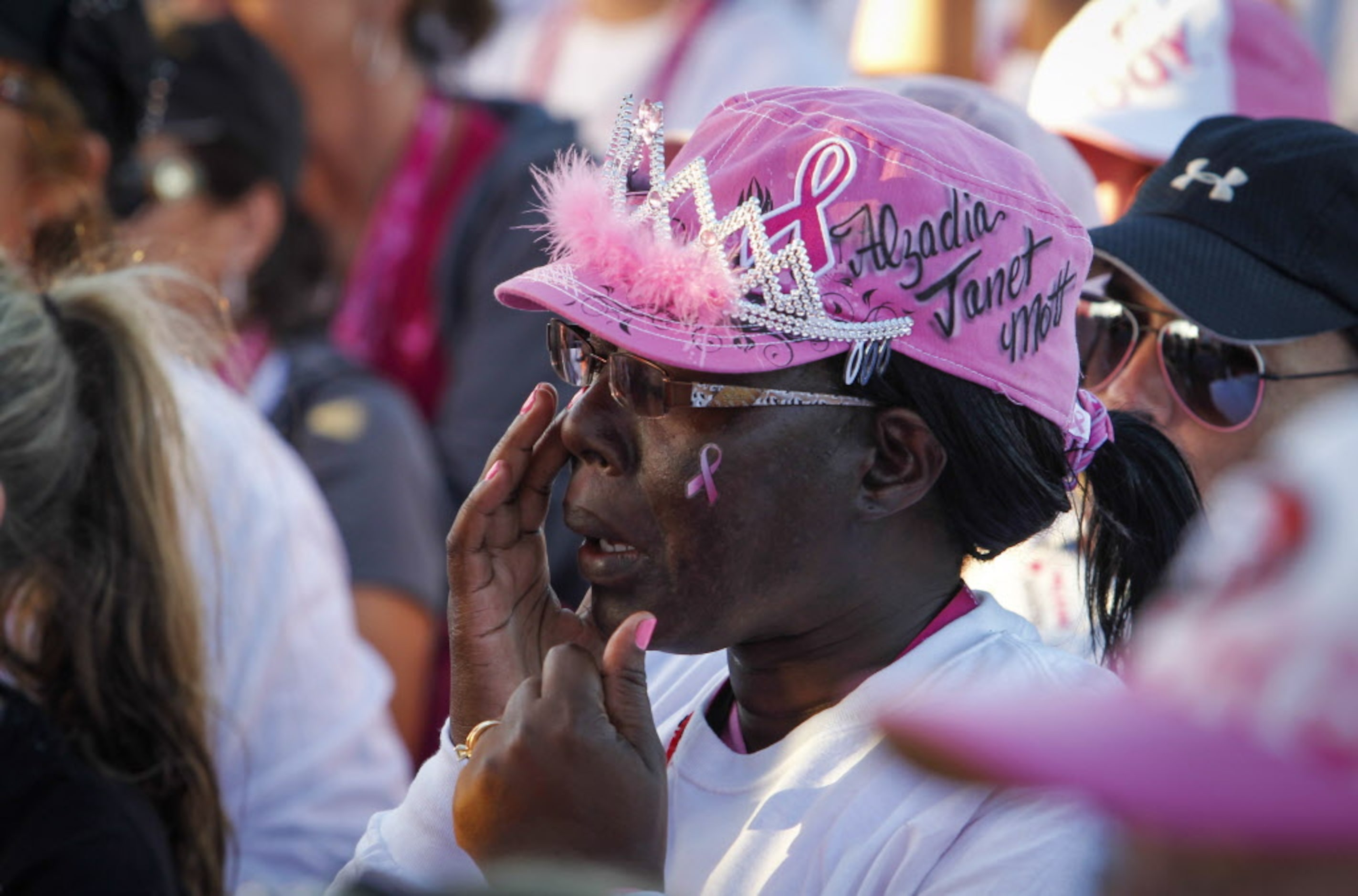 Yolanda Williams of Augusta, Ga. wipes away a tear during the closing ceremony of the 2014...