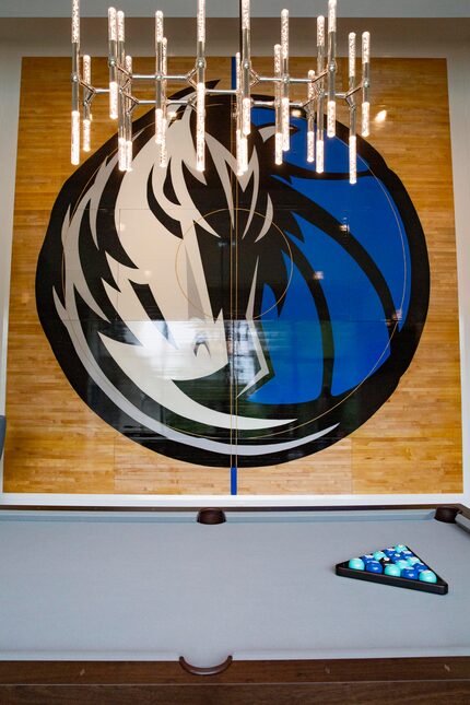 Mavs super fan Mark Thompson's, owner of Smith-Thompson security company, center area of the...