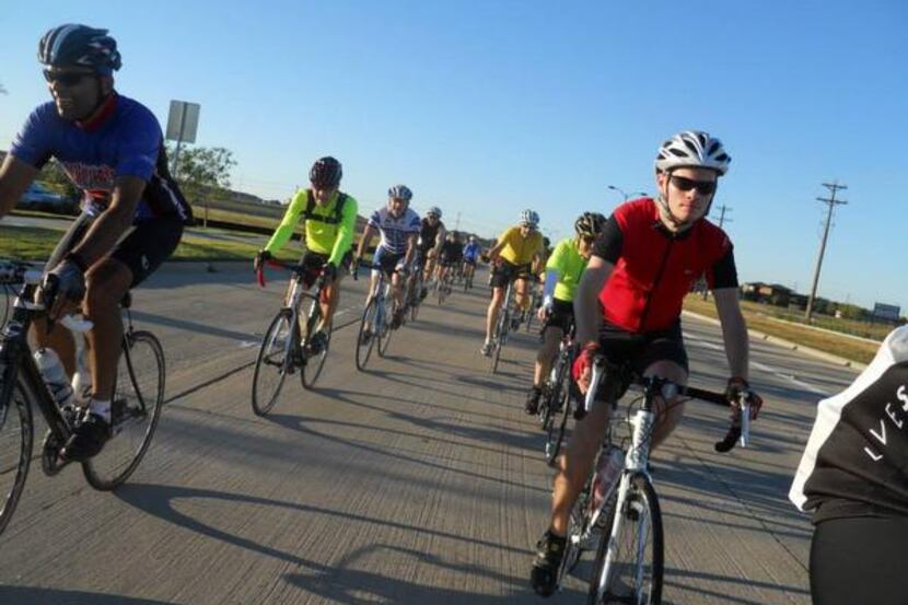 
Plano cyclists take the streets during a Plano Bike Association group ride. The...