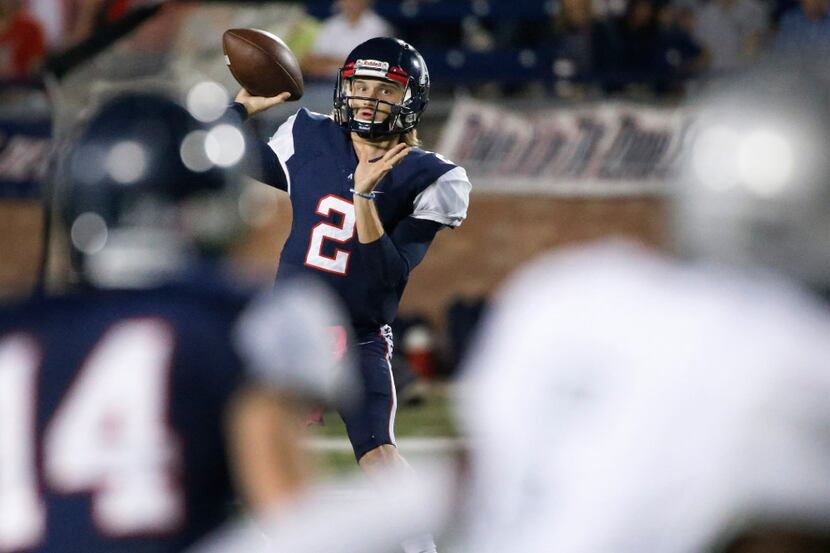 Allen quarterback Mitchell Jonke (2) looks for a receiver in the first quarter during the...