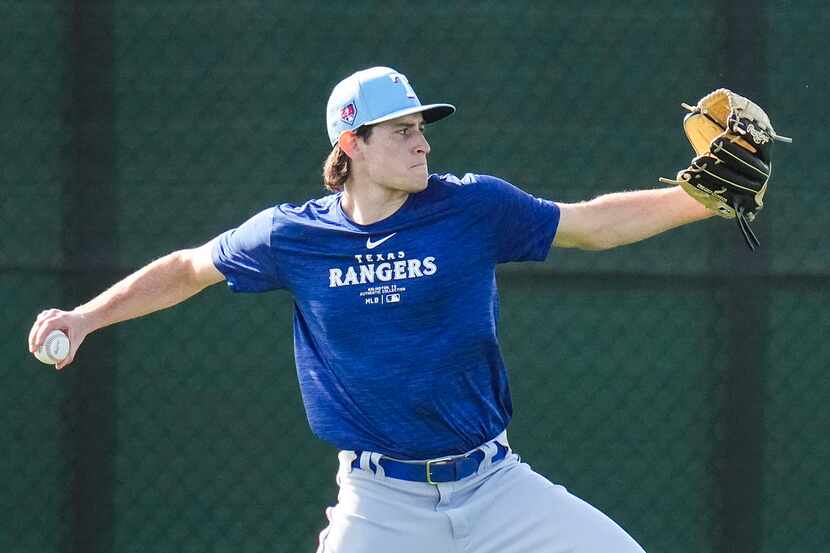Texas Rangers minor league pitcher Aidan Curry participates in a spring training workout on...
