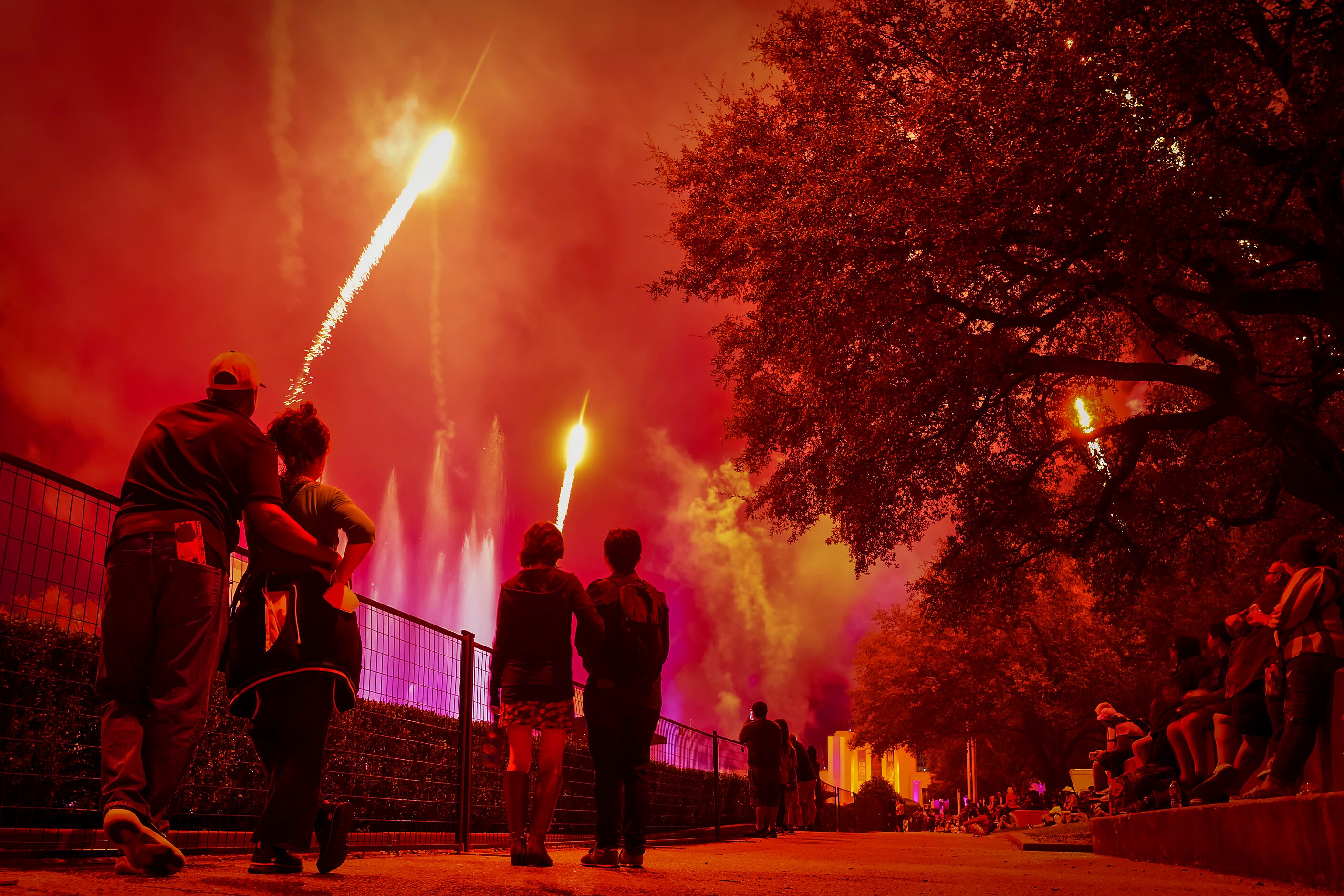 Fireworks explode during the Mattress Firm Illumination Sensation on opening day at the...