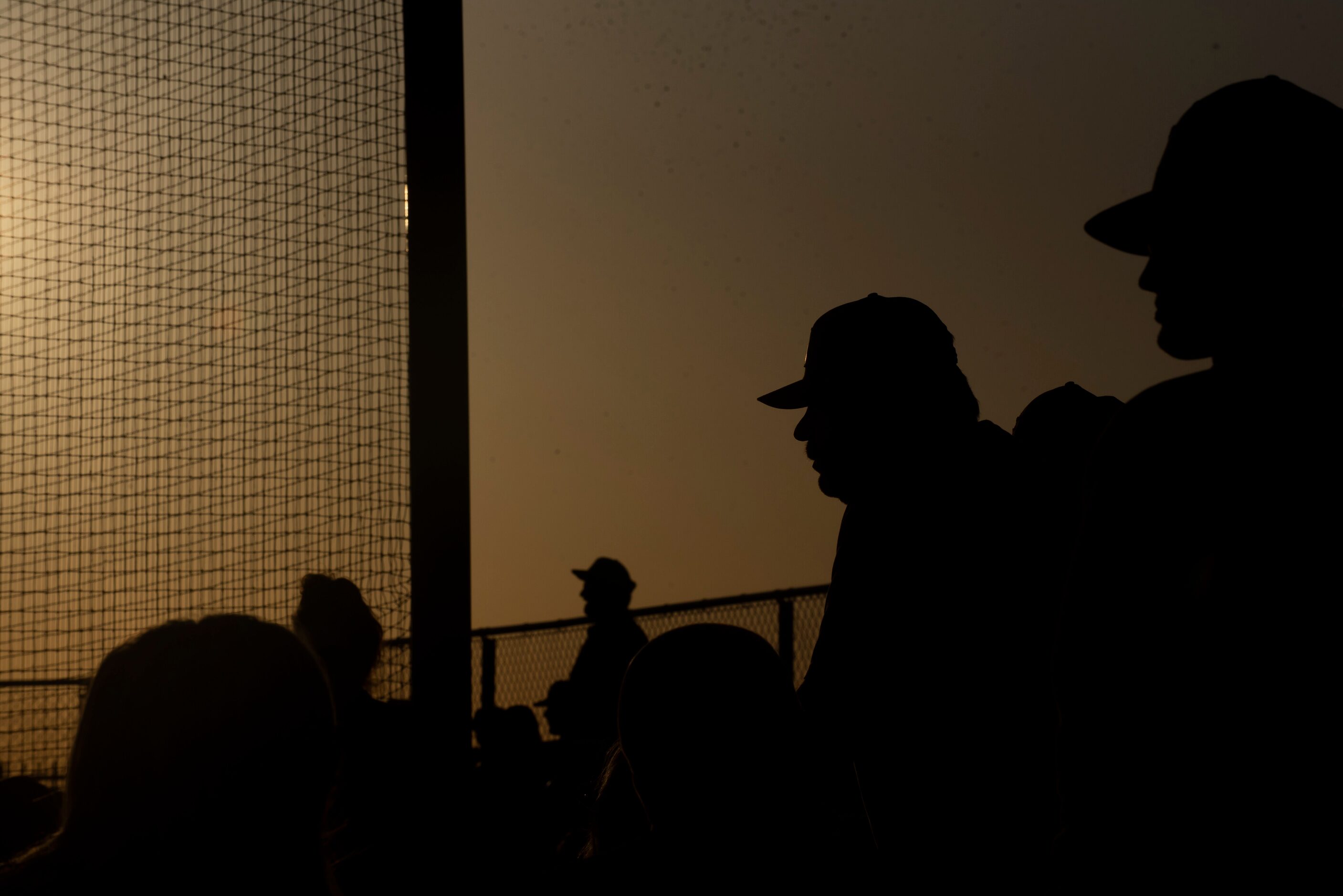 Fans watch a baseball game between Crandall High School and Forney High School at Crandall...