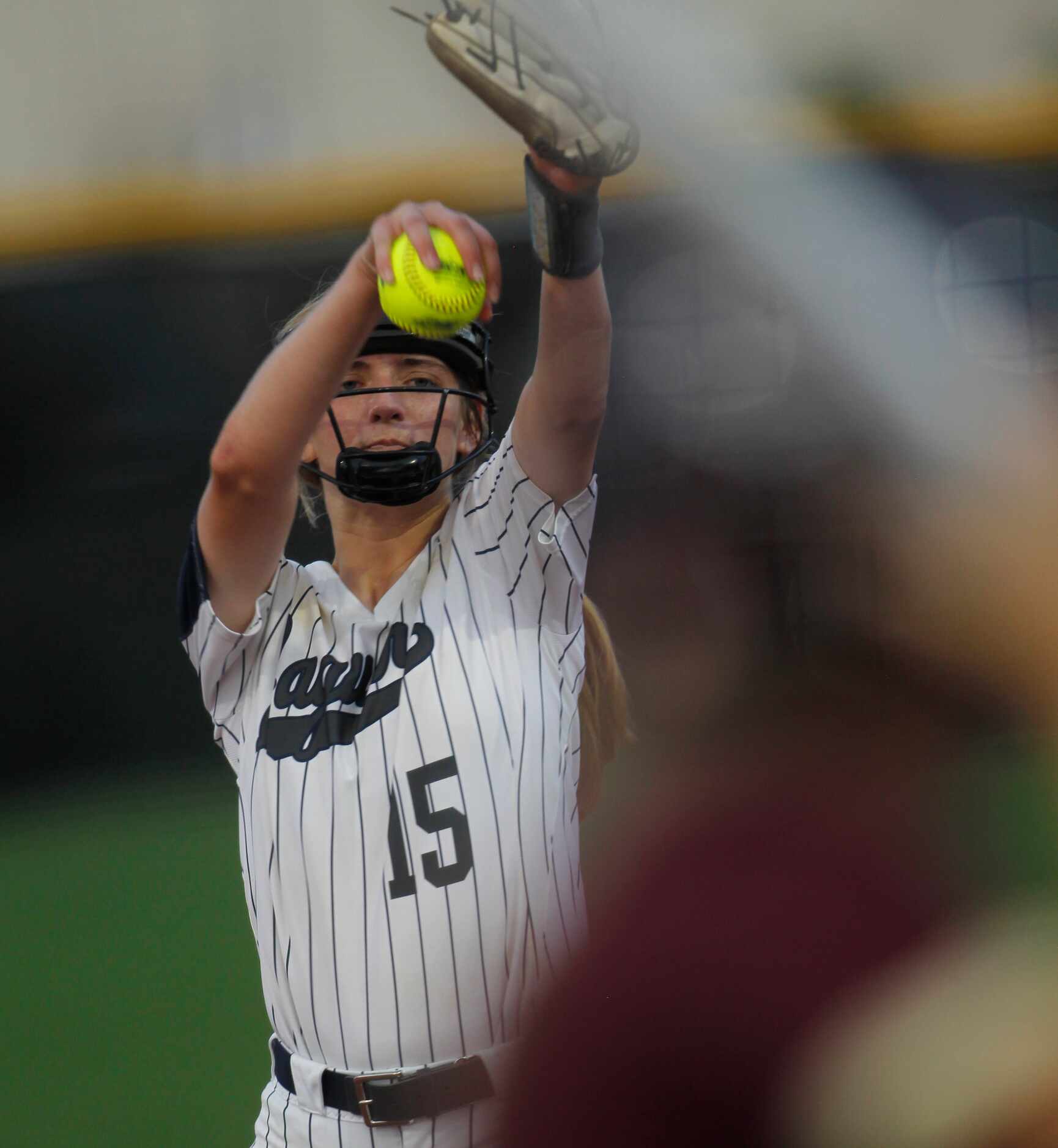 Flower Mound pitcher Landrie Harris (15) prepares to deliver a pitch to a Deer Park batter...