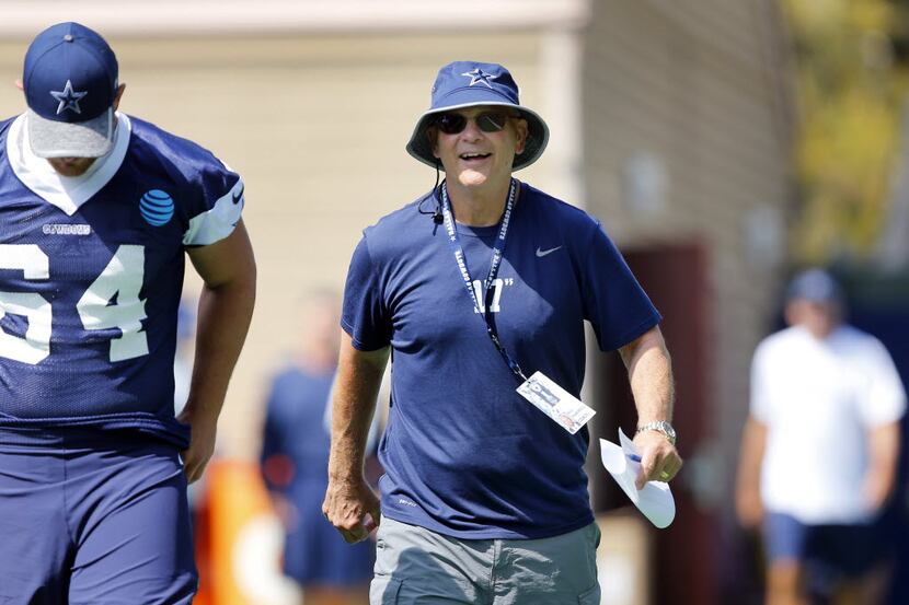 Dallas Cowboys defensive coordinator Rod Marinelli heads to the practice field f ora morning...