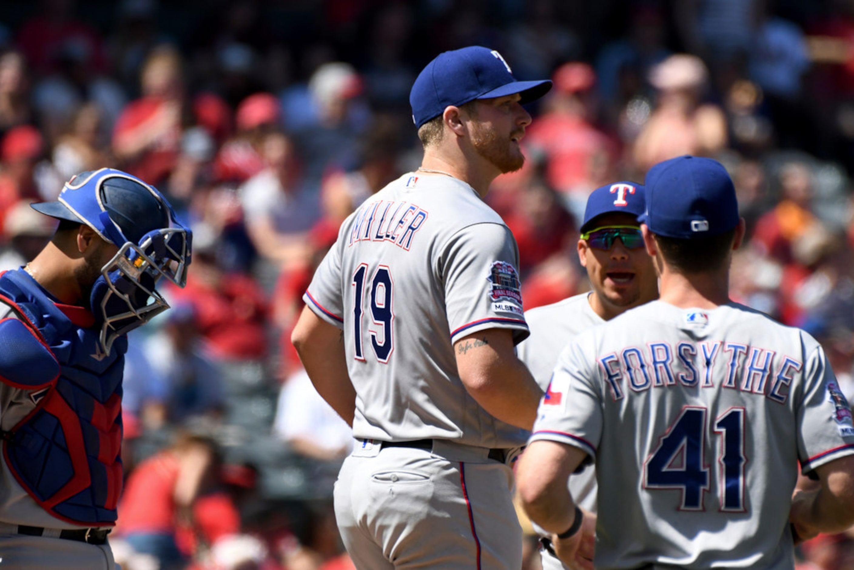 Texas Rangers pitcher Shelby Miller (19) stands on the mound after loading the bases with...