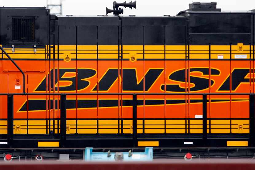 A Burlington Northern Santa Fe (BNSF) train sits at the BNSF Alliance Intermodal facility in...