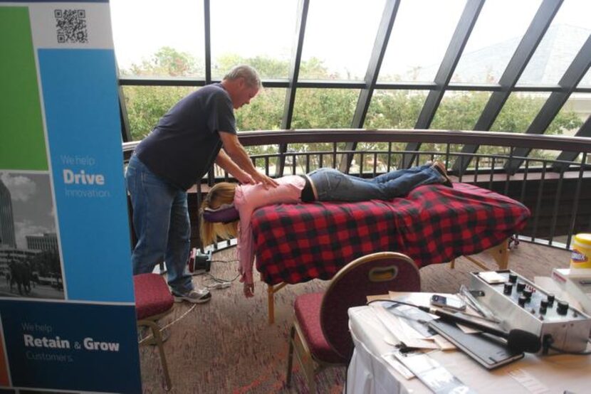 
Massage therapist Robert Massey gave last year’s conference-goers a little stress relief...