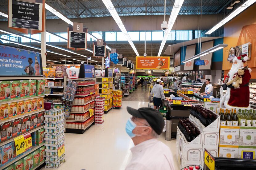 Shoppers inside a Kroger grocery store on East Mockingbird Lane in Dallas, on Tuesday, Nov....