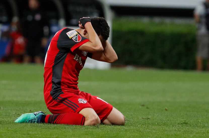 Toronto FC Ager Aketxe holds his head in disbelief after missing a shot to score against...