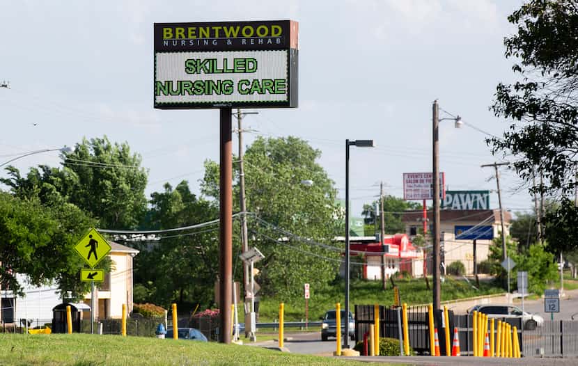 A sign outside of Brentwood Nursing & Rehab on April 24, 2020 in Dallas. (Juan Figueroa/ The...