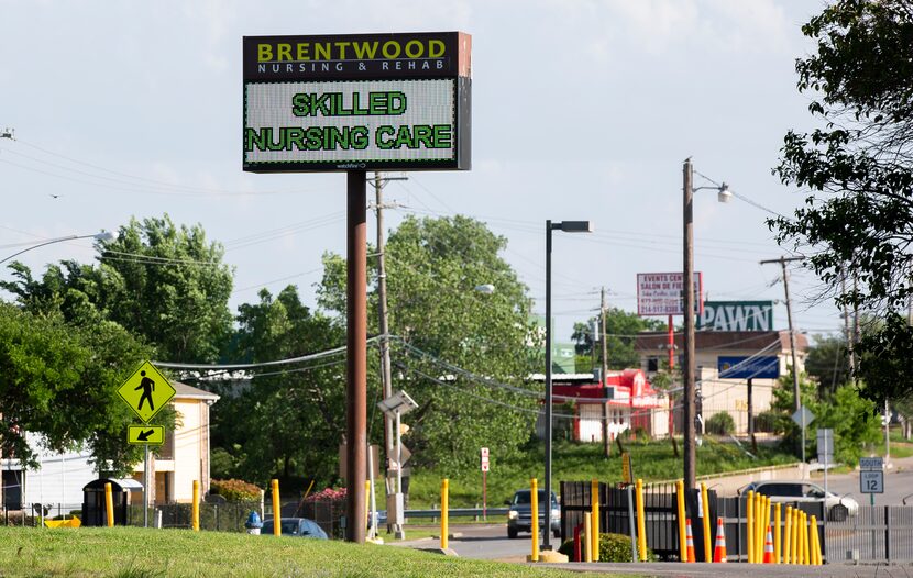 A sign outside of Brentwood Nursing & Rehab on April 24, 2020 in Dallas. (Juan Figueroa/ The...