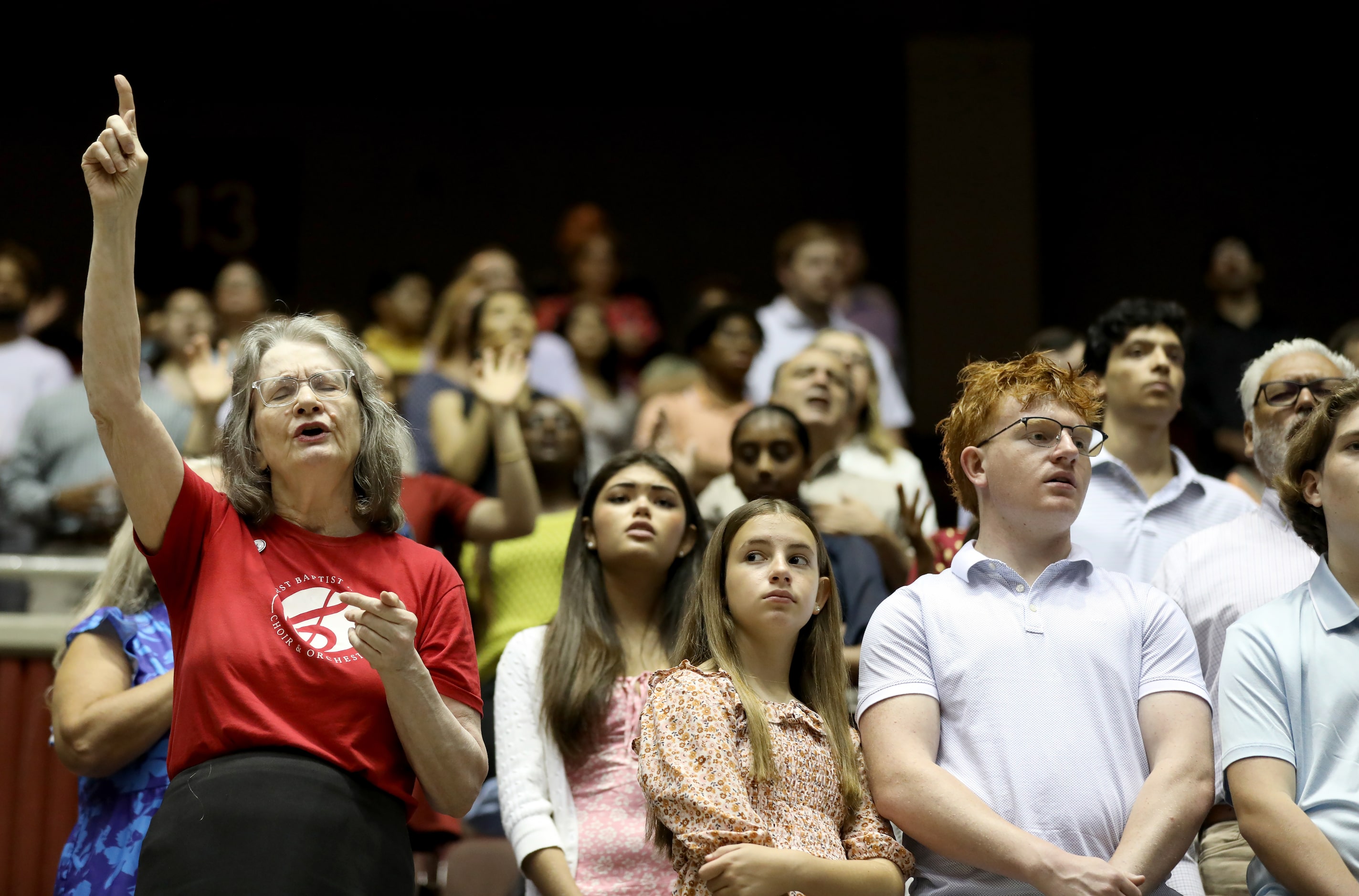 First Baptist Church members participate in Sunday service held at the Dallas Convention...