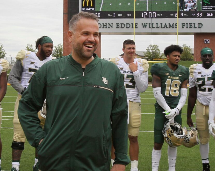 Baylor Head Football coach Matt Rhule smiles during halftime of the NCAA college football...