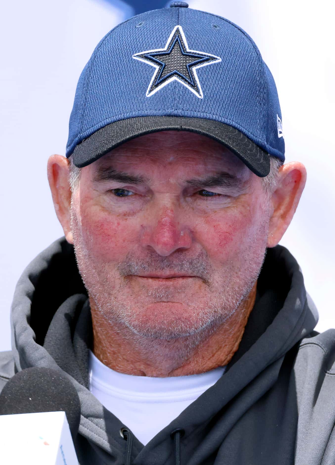 Dallas Cowboys defensive coordinator Mike Zimmer answers questions from the media following...